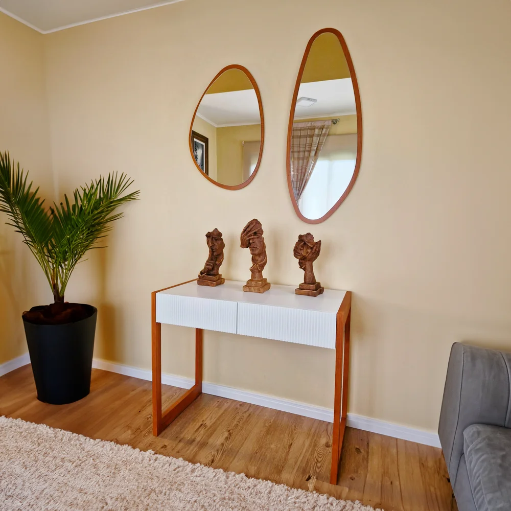 espelho organico pendurado na parede